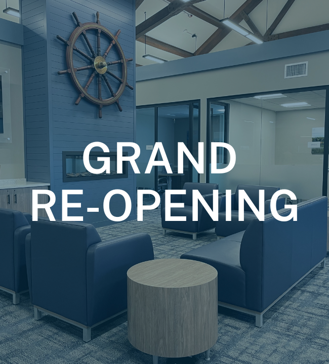 Orleans Banking Center lobby with Grand Re-opening text