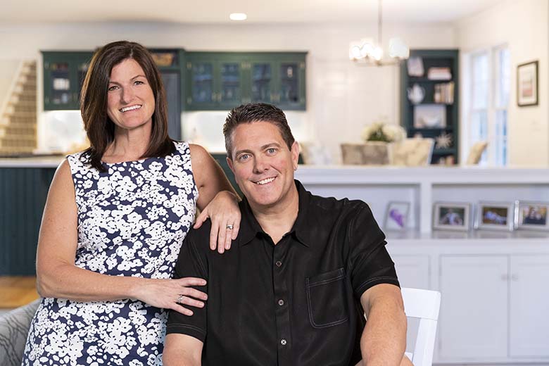 Mortgage clients in home smiling