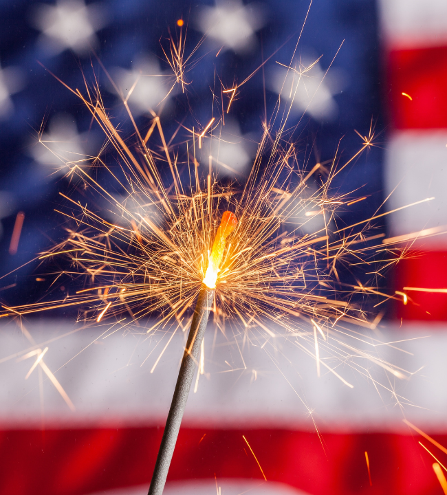 Sparkler in front of American flag