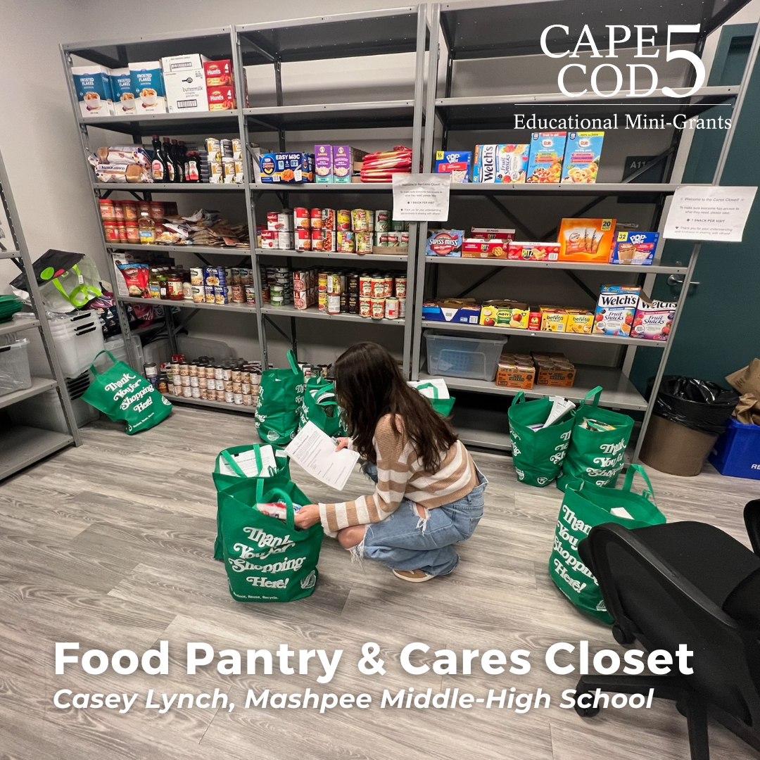 Student packing bag in food pantry
