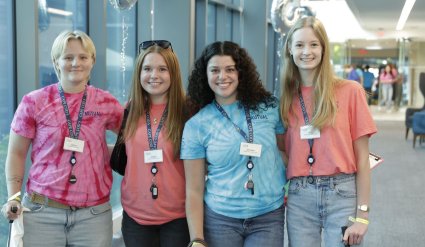 Cape Cod 5 interns at employee party smiling