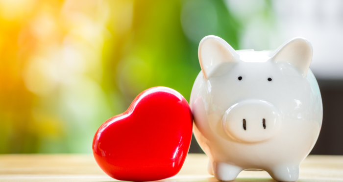 Piggy bank and red heart